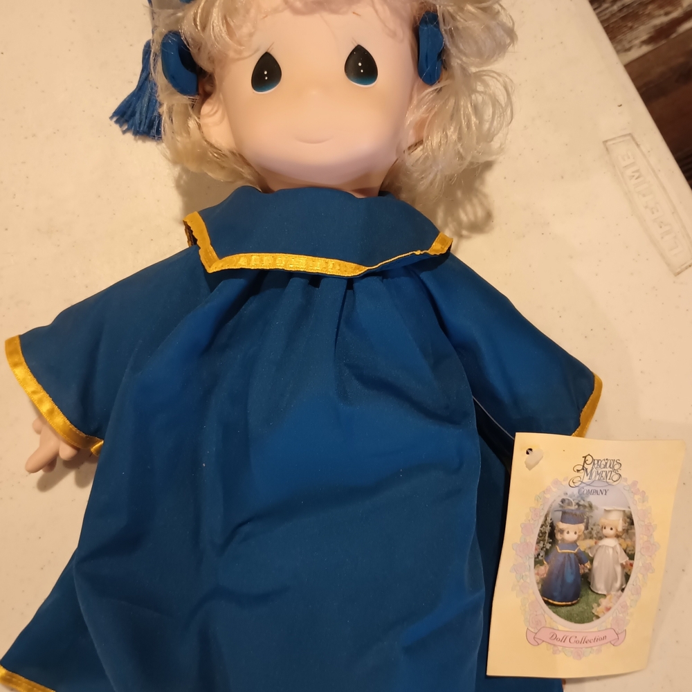 Precious Moments Doll in Blue with Gold Trim